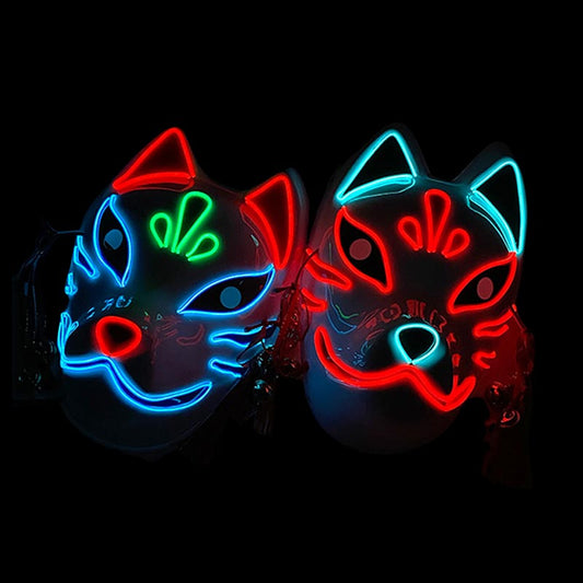 Zwei LED Fuchsmasken mit rotem und blauem Leuchteffekt nebeneinander