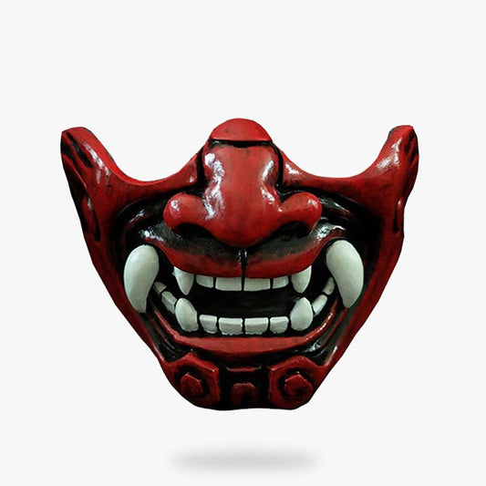 Oni Maske Rot zeigt die Gesichtshalfte eines japanischen Dämons mit spitzen Zahnen