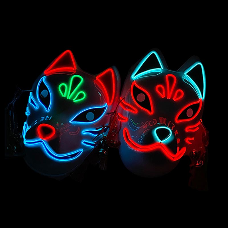 Zwei LED Fuchsmasken mit rotem und blauem Leuchteffekt nebeneinander
