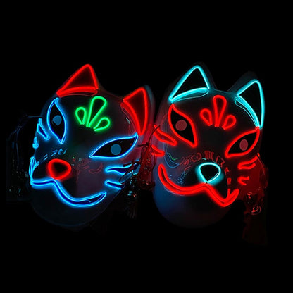 Zwei LED Fuchsmasken mit rotem und blauem Leuchteffekt nebeneinander